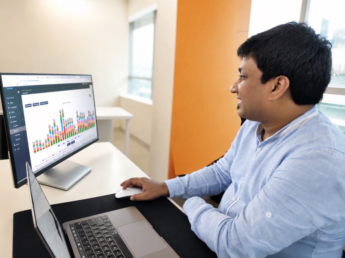 Kunal Prasad working on a software product at his computer